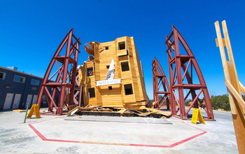 Photo of wood structure after testing on a shake table